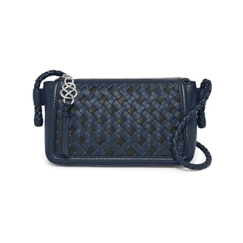 Brighton woven leather crossbody handbag in navy and black with braided strap and silver-tone hardware on a white background