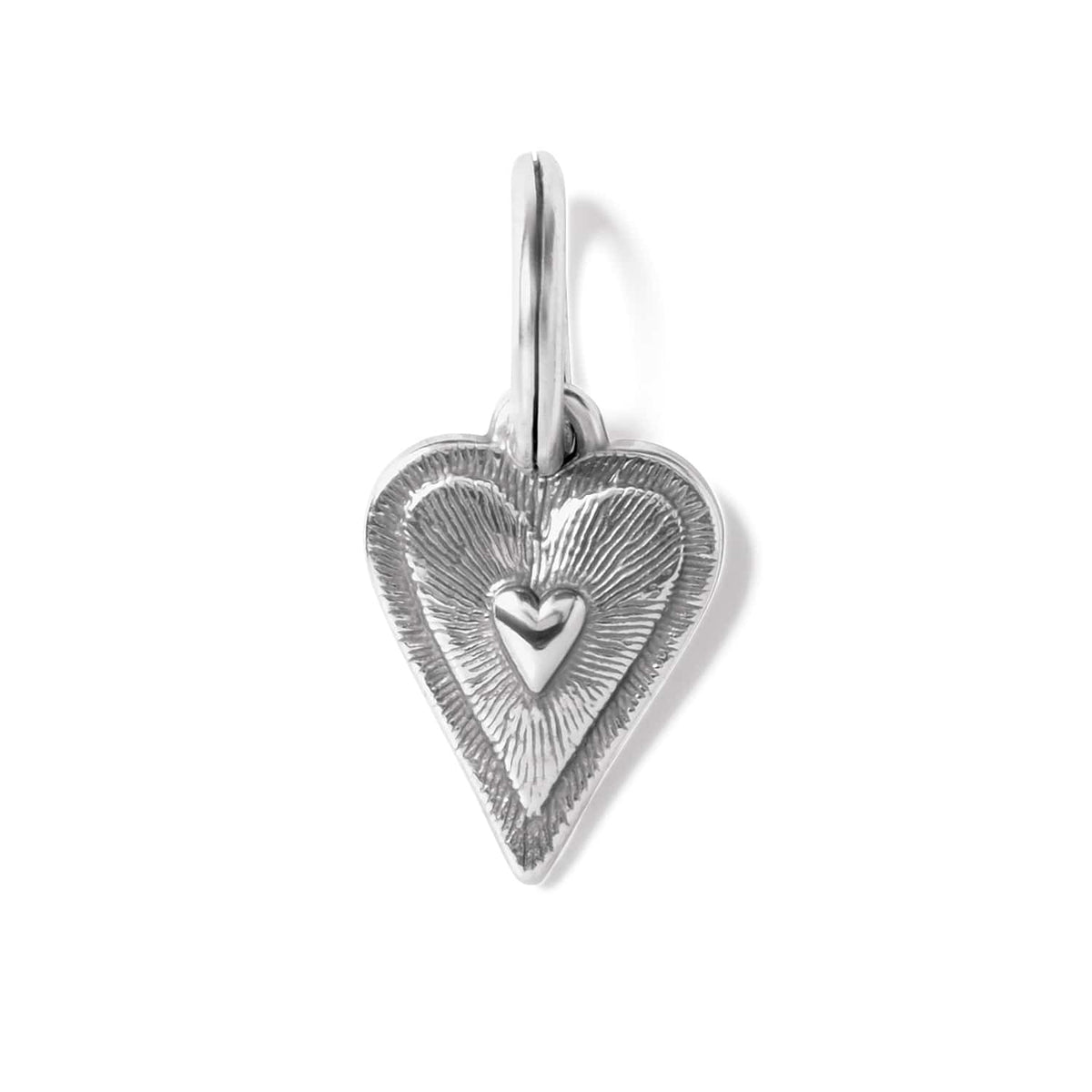Brighton heart charm with silver-plated finish, textured radiating lines, and raised center heart on a white background