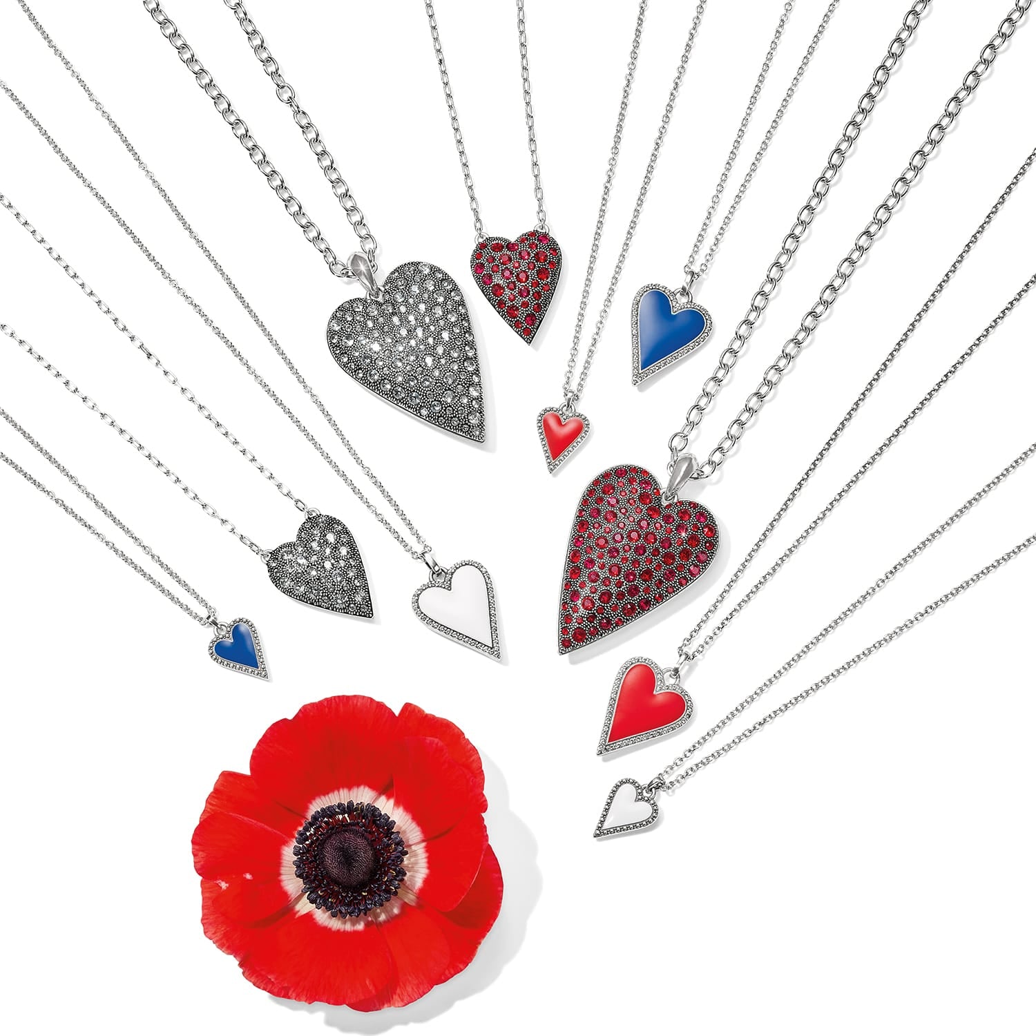 Brighton heart pendant necklaces in silver-plated finish with enamel and crystal accents, styled with a red poppy