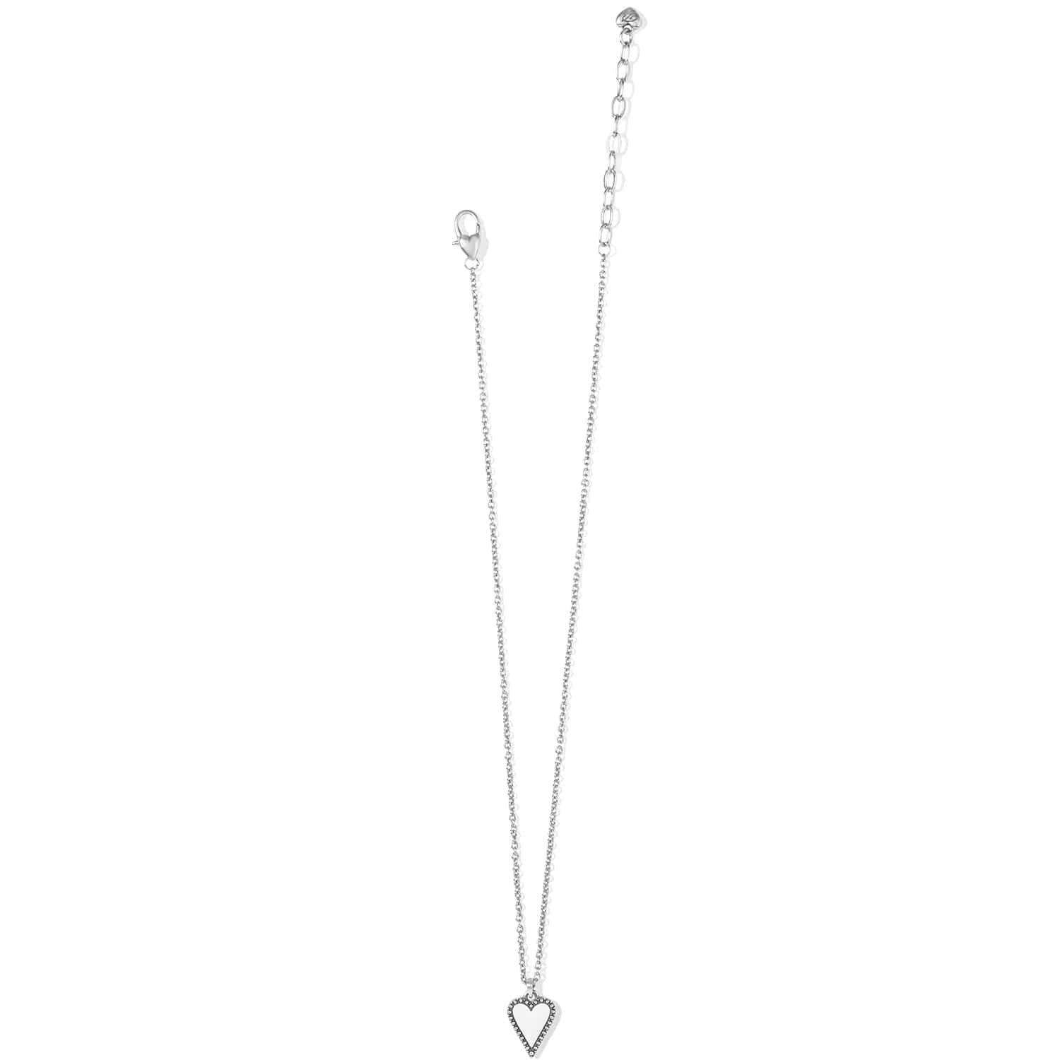 Brighton heart pendant necklace with white enamel center, silver-plated beaded border, and chain on a white background