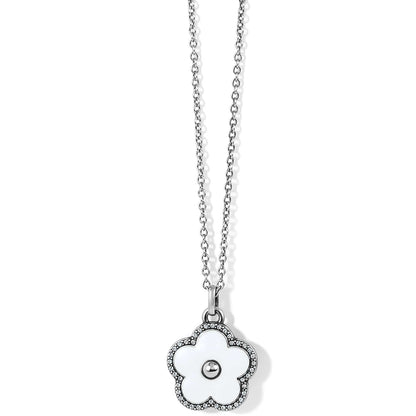 Brighton pendant necklace with silver-plated flower charm, white enamel petals, and crystal trim on a white background