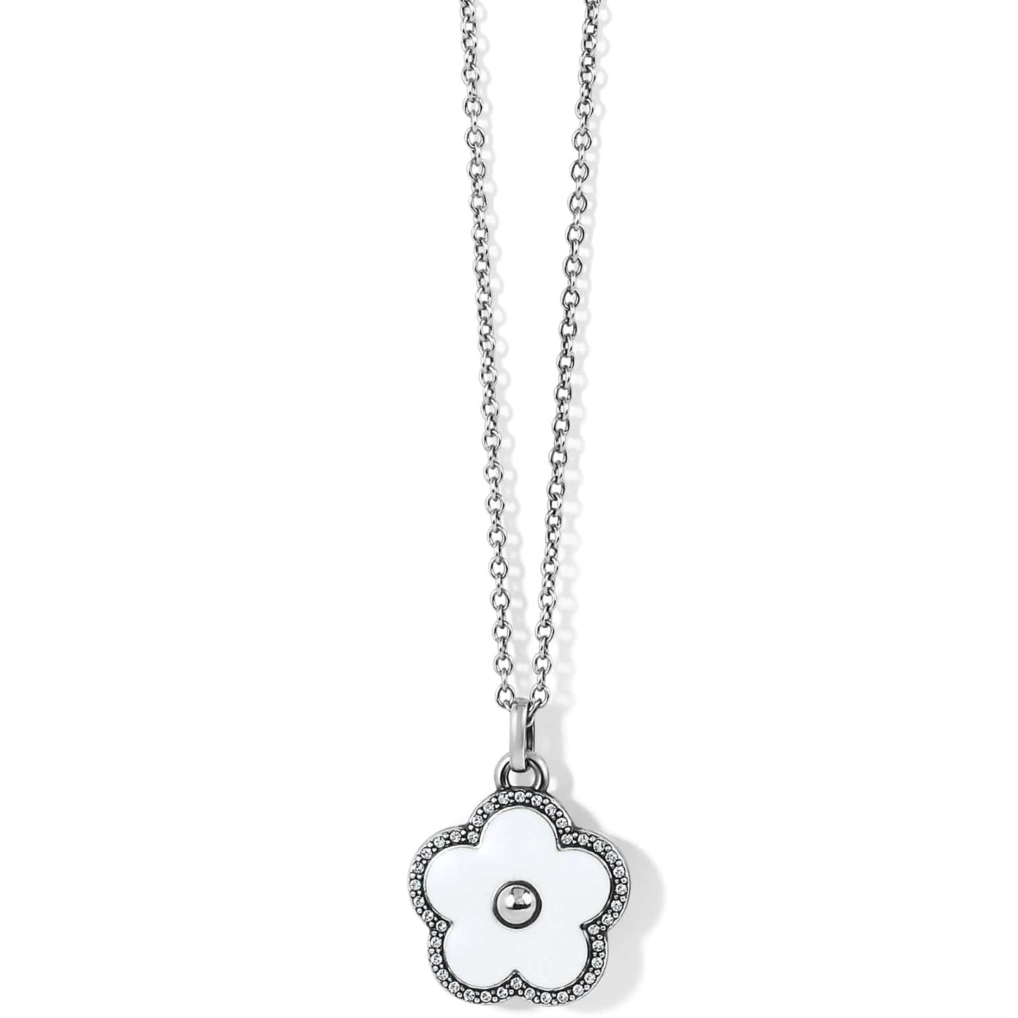 Brighton pendant necklace with silver-plated flower charm, white enamel petals, and crystal trim on a white background