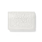Brighton wallet in white leather with embossed LOVE lettering and heart motifs on a white background