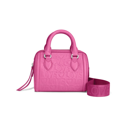 Brighton pink leather handbag with embossed love print, top handles, and matching pink crossbody strap on a white background