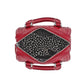 Brighton red leather handbag shown open with heart-print interior lining and silver-tone zipper on a white background