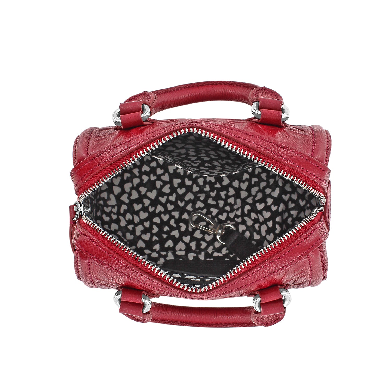 Brighton red leather handbag shown open with heart-print interior lining and silver-tone zipper on a white background