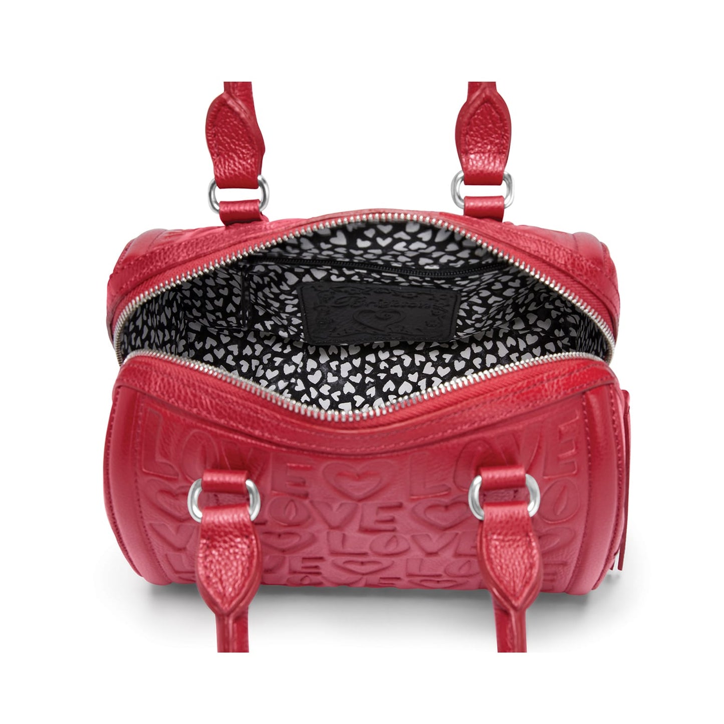 Close-up of Brighton red leather handbag shown open with black heart-print interior lining and embossed love motif