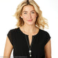 Model wearing a Brighton long silver-plated chain necklace with round pendant and crystal heart stud earrings