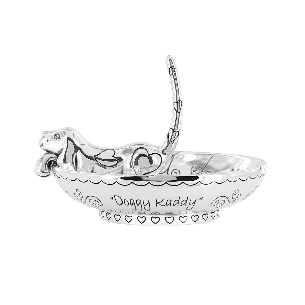 Brighton silver-plated ring holder dish with reclining dog figure, heart accents, and "Doggy Kaddy" engraving on a white background