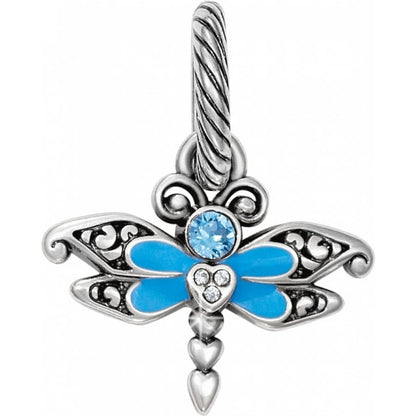 Brighton dragonfly charm with silver-plated filigree wings, blue enamel body, and crystal accents on a white background