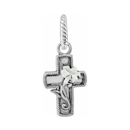Brighton cross charm with silver-plated finish, rope border, and white enamel flower accent on a white background