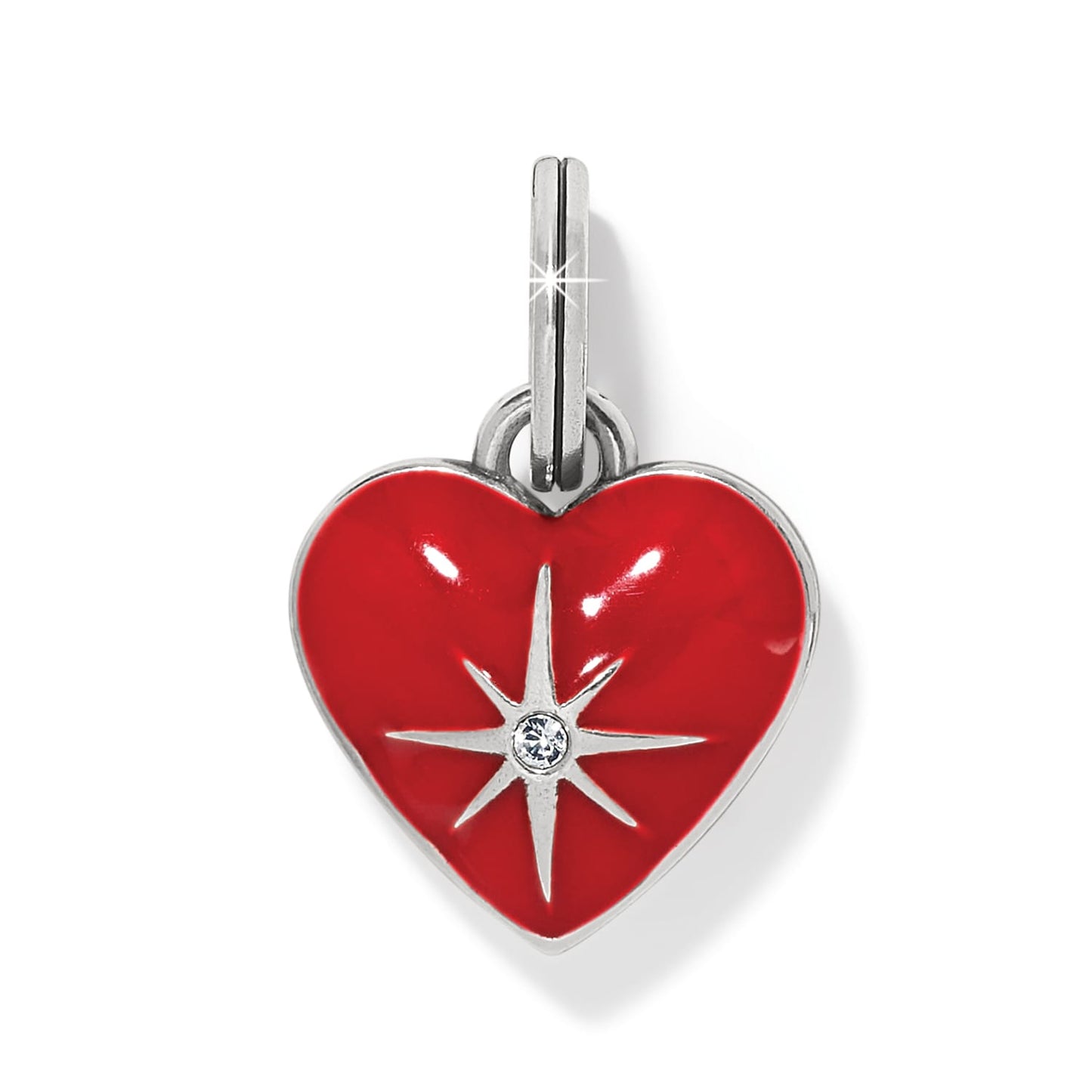 Brighton heart charm with red enamel, silver-plated starburst detail, and crystal center on a white background
