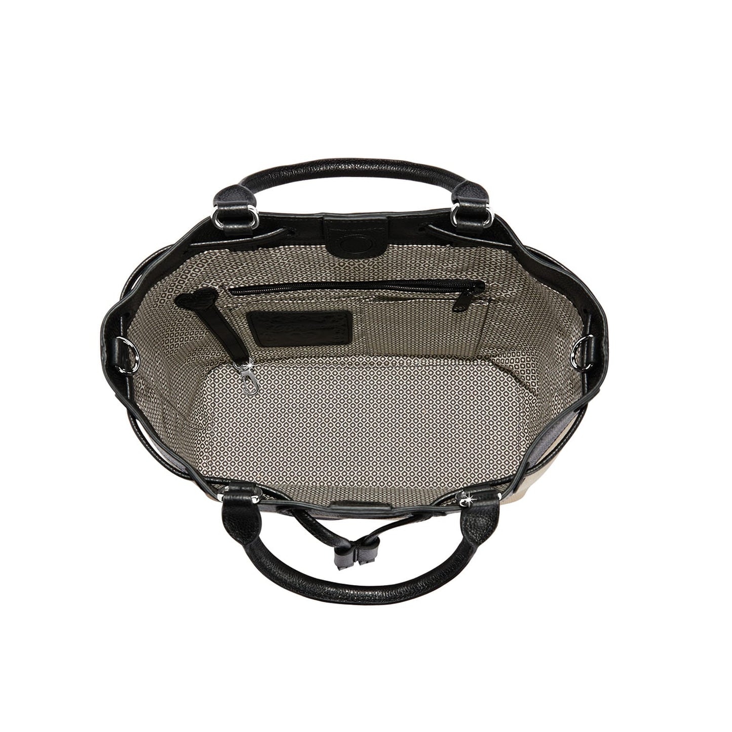 Close-up of Brighton handbag interior view with patterned fabric lining, zippered pocket, and black leather handles