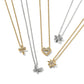 Brighton pendant necklaces with gold and silver chains featuring cross, butterfly, heart, flower, and star crystal pendants on a white background