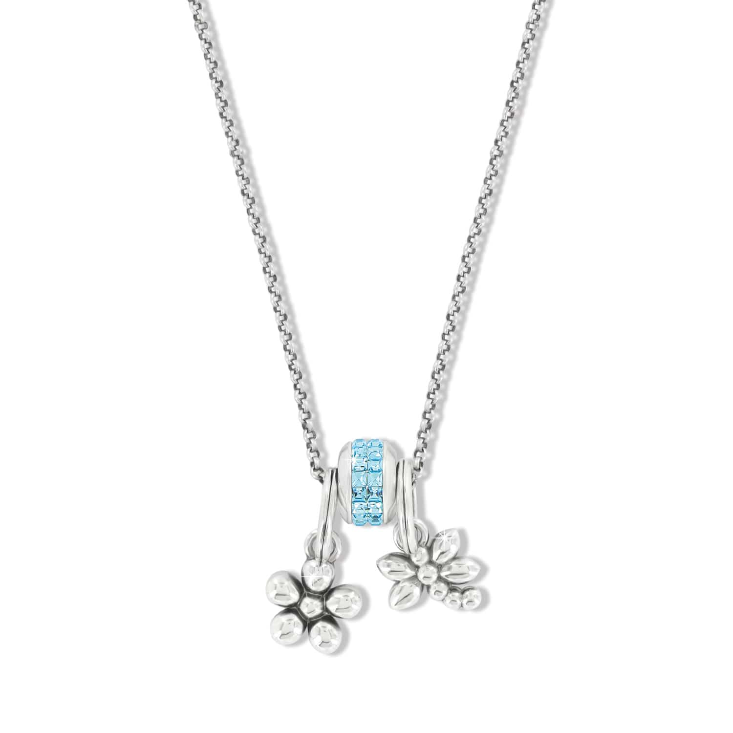 Brighton pendant necklace with blue crystal bead and two silver-plated flower charms on a white background