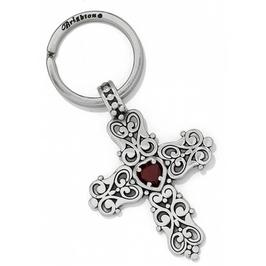 Brighton cross keychain with silver-plated scrollwork design and red heart-shaped crystal center on a white background