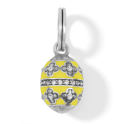 Brighton egg charm with yellow enamel, silver-plated floral accents, and crystal band on a white background