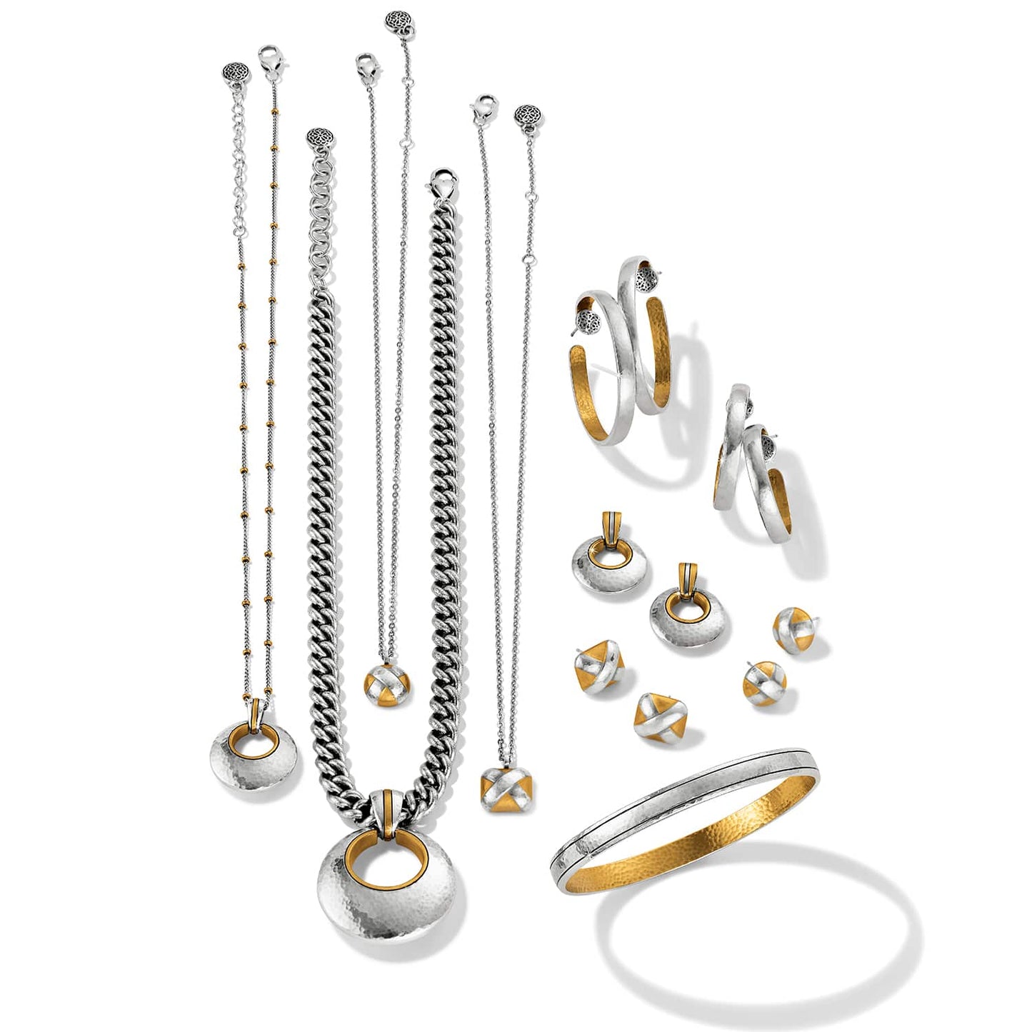 Brighton jewelry collection styled with two-tone necklaces, hoop earrings, stud earrings, and a hammered bangle bracelet