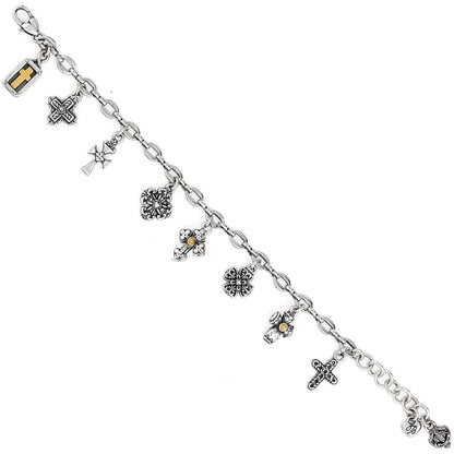 Brighton charm bracelet with silver-plated crosses, florals, and gold-plated accents on a white background