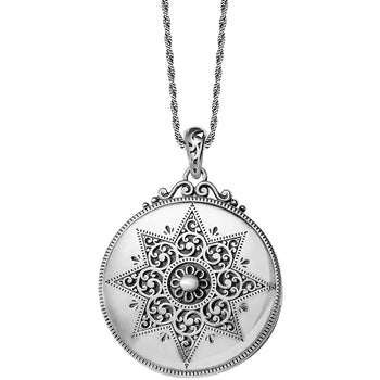 Brighton pendant necklace with silver-plated round medallion featuring ornate eight-point star filigree design on a white background