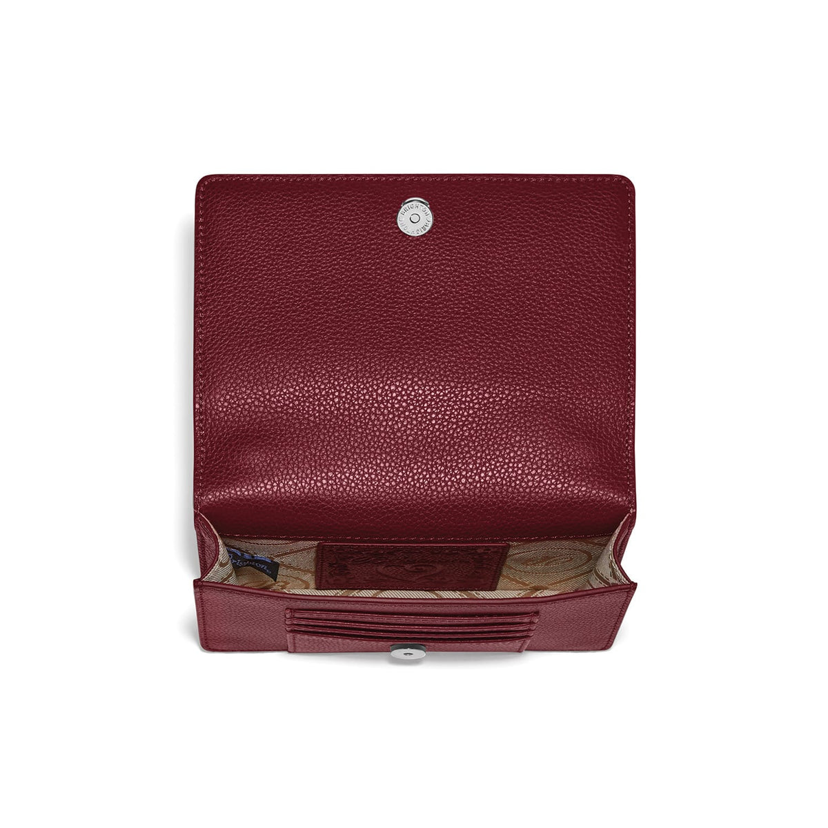 Brighton burgundy leather wallet shown open with card slots, patterned fabric interior, and silver-tone snap closure on a white background
