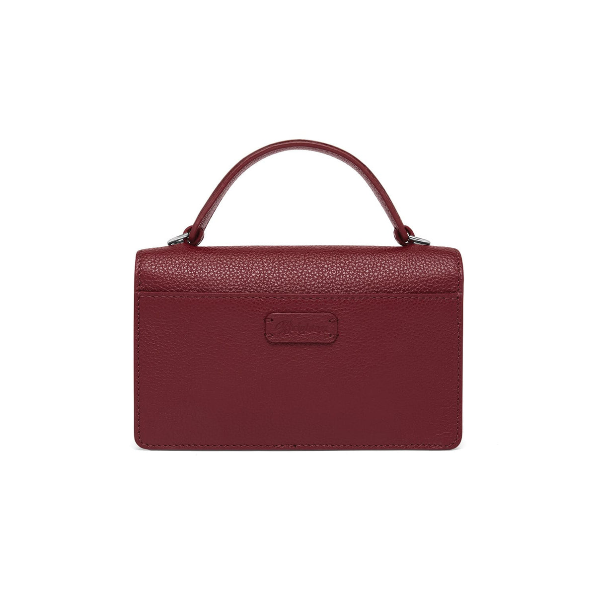 Brighton handbag shown from the back in burgundy pebbled leather with top handle and logo patch on a white background