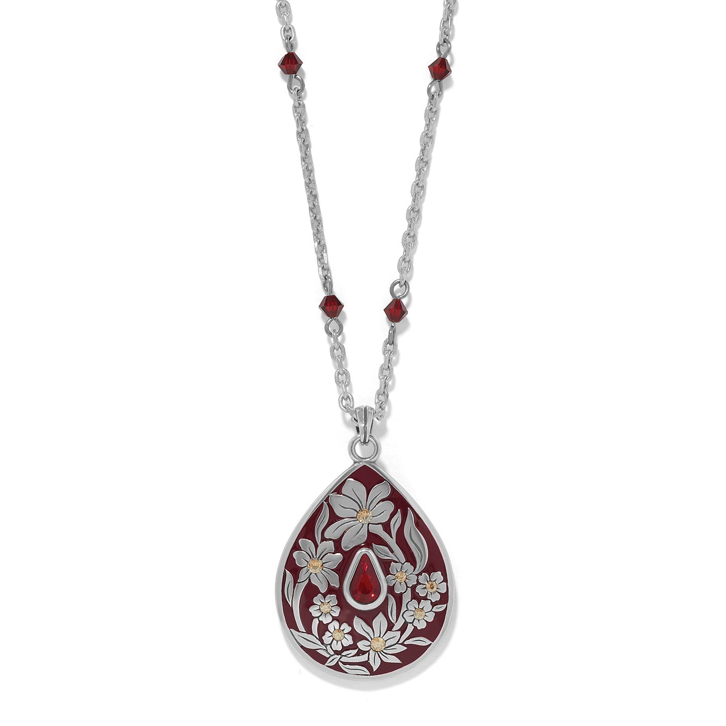 Brighton silver-plated pendant necklace with red enamel teardrop, white floral design, and red crystal beads on a white background