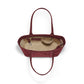 Brighton red leather handbag interior view showing patterned fabric lining, zip pocket, and dual shoulder straps on a white background