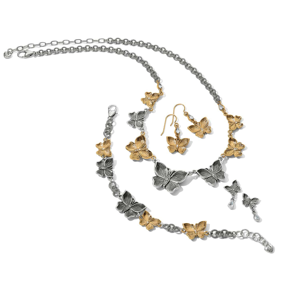Brighton two-tone butterfly jewelry set styled with matching necklace, bracelet, and earrings featuring crystal accents on white