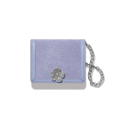 Brighton wallet in lavender snake-embossed leather with silver-tone flower closure and chain wristlet on a white background