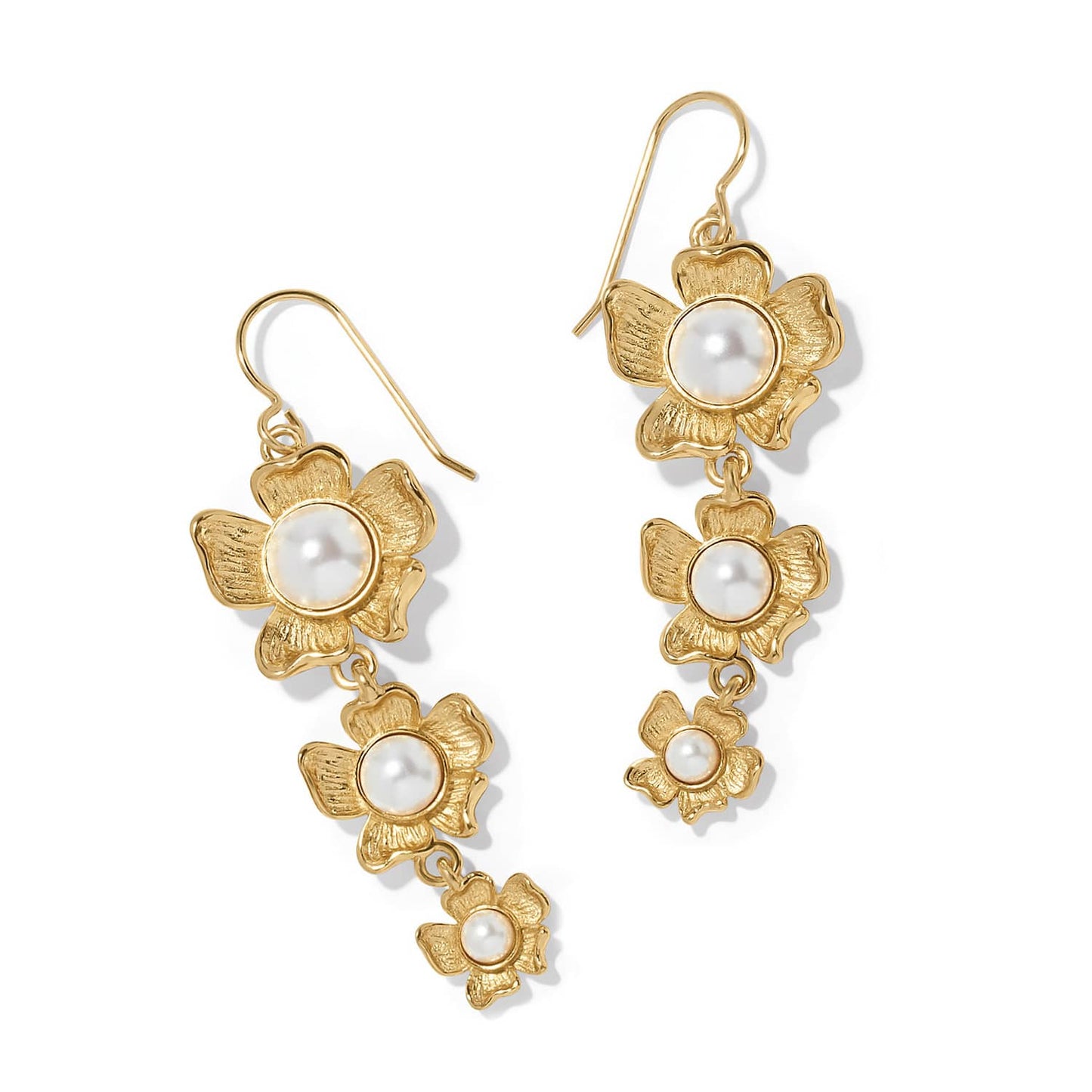 Brighton drop earrings with tiered gold-plated flowers and glass pearl cabochon centers on a white background