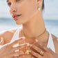 Model wearing Brighton pearl drop earrings with crystal accents and coordinating Brighton accessories including layered necklaces
