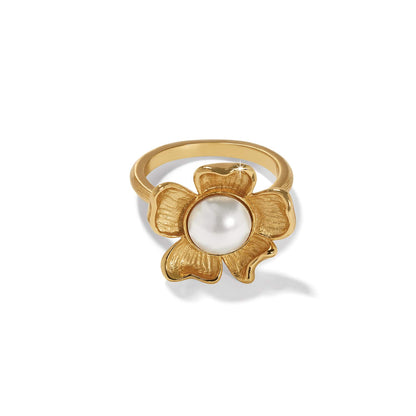 Brighton ring with gold-plated flower design and glass pearl cabochon center on a white background