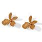 Brighton floral stud earrings with gold-plated four-petal design and textured petal detail on a white background