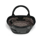 Brighton black handbag interior view showing patterned fabric lining, zippered pocket, and rolled top handles on a white background