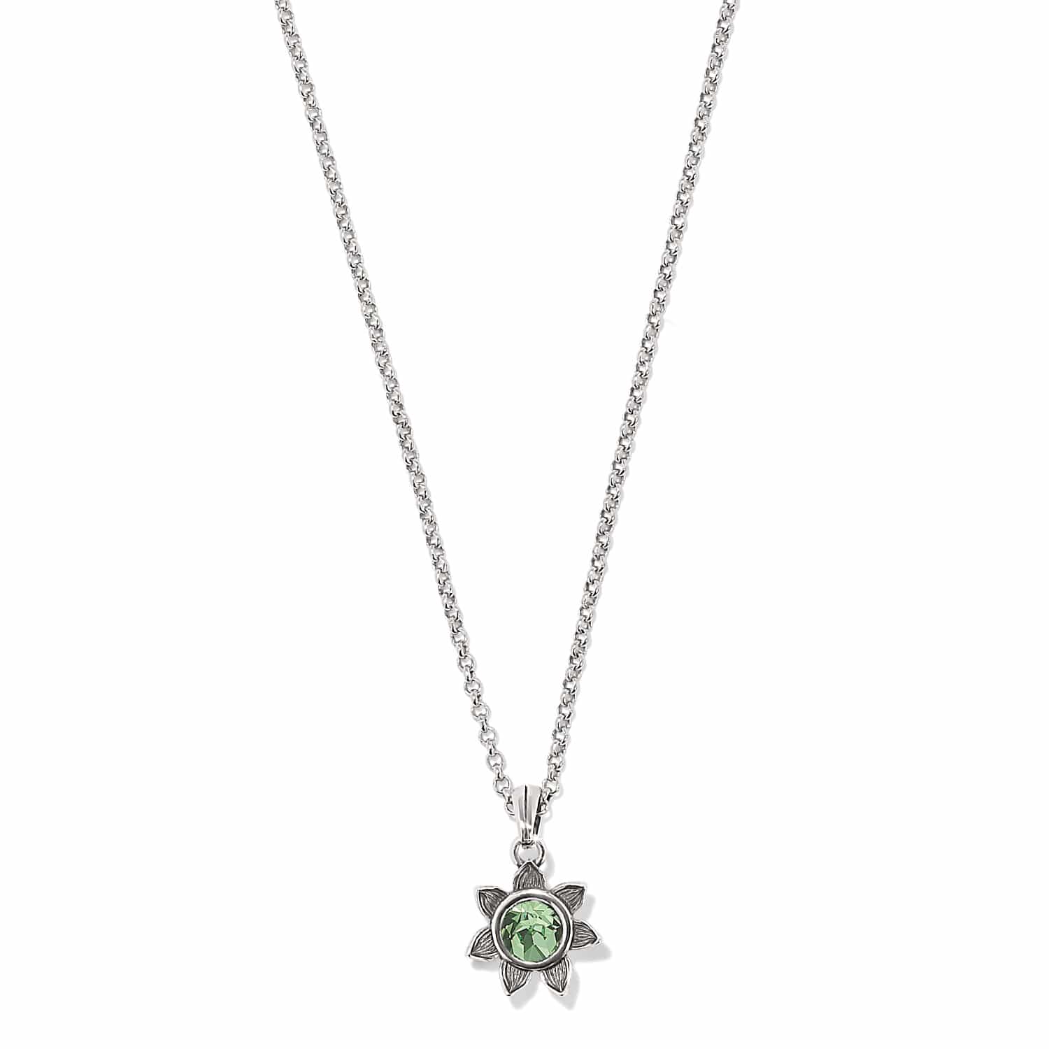 Brighton pendant necklace with green crystal flower charm and silver-plated chain on a white background