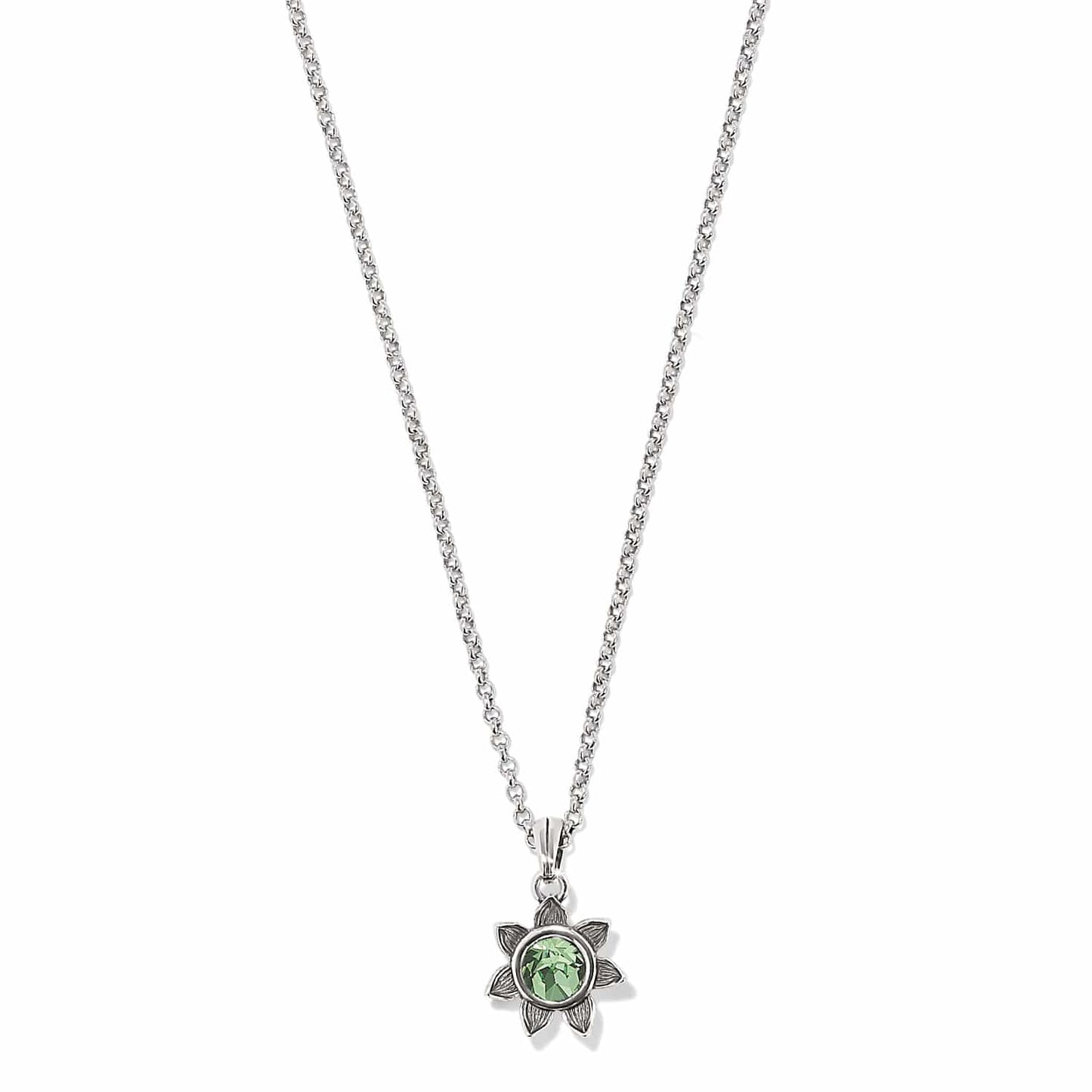 Brighton pendant necklace with green crystal flower charm and silver-plated chain on a white background