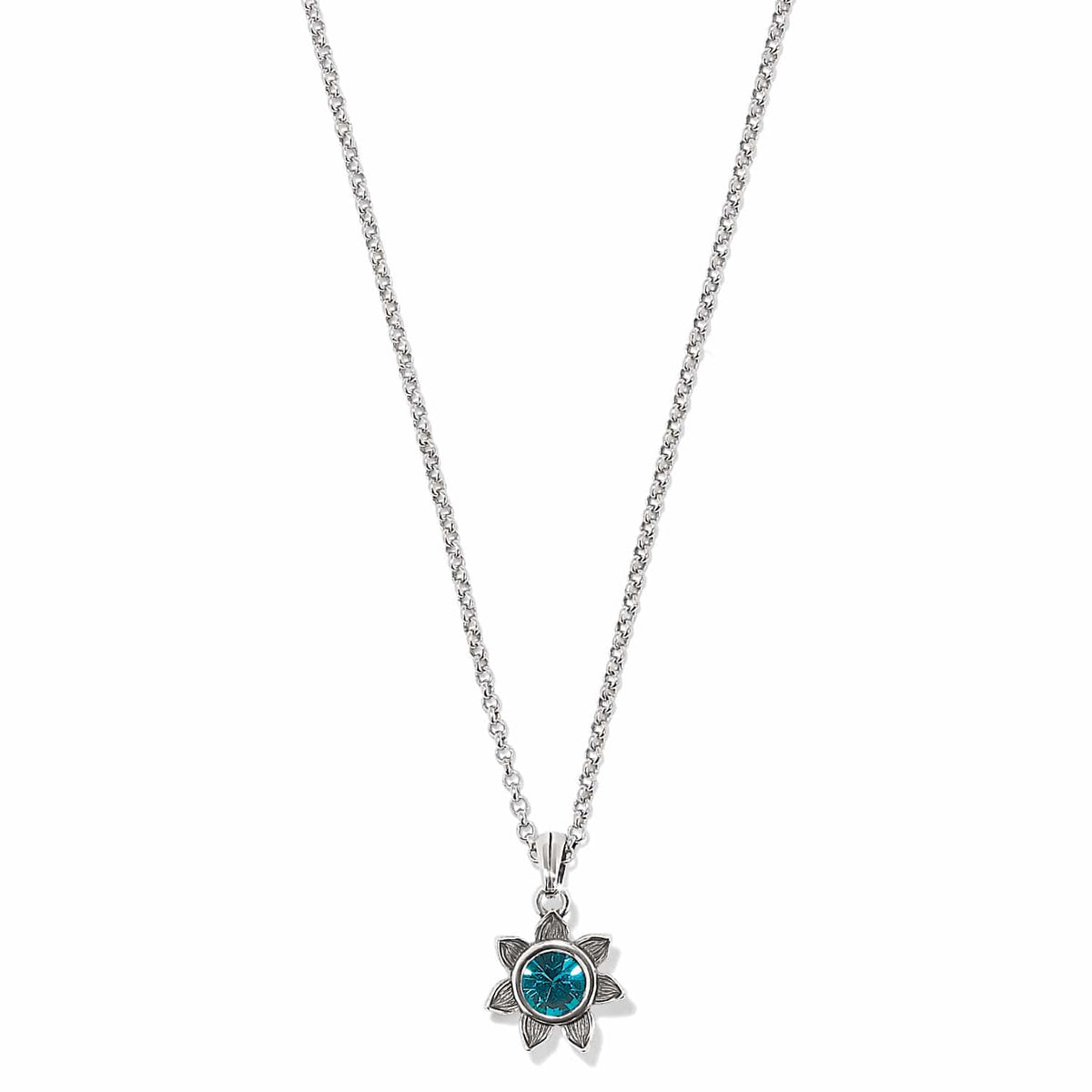 Brighton pendant necklace with silver-plated flower setting and blue crystal center on a white background
