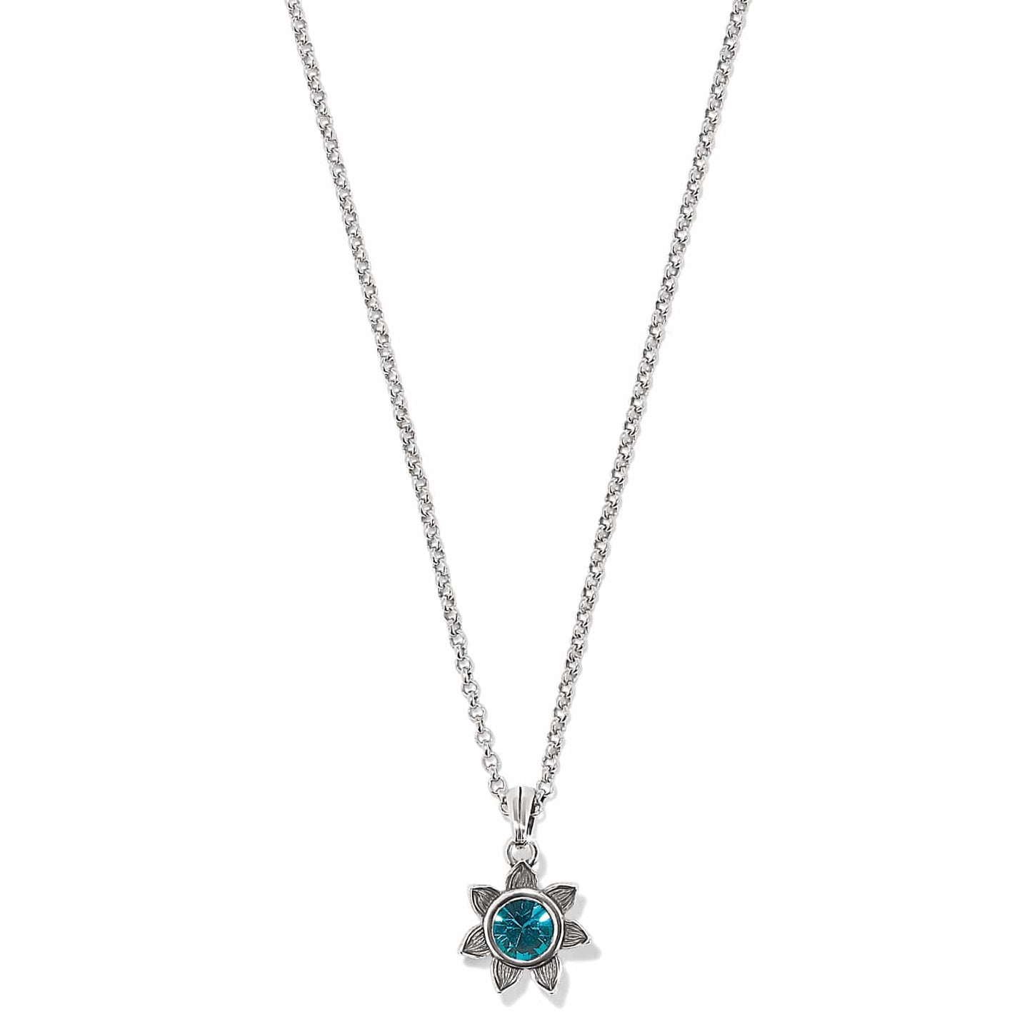 Brighton pendant necklace with silver-plated flower setting and blue crystal center on a white background