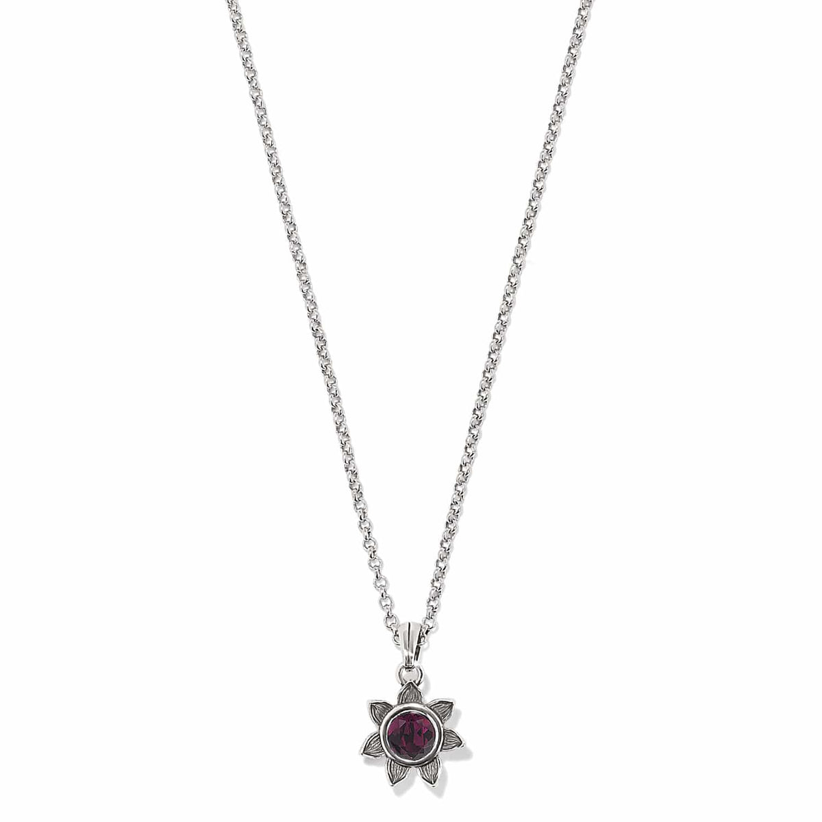 Brighton pendant necklace with silver-plated flower setting and faceted purple crystal on a white background