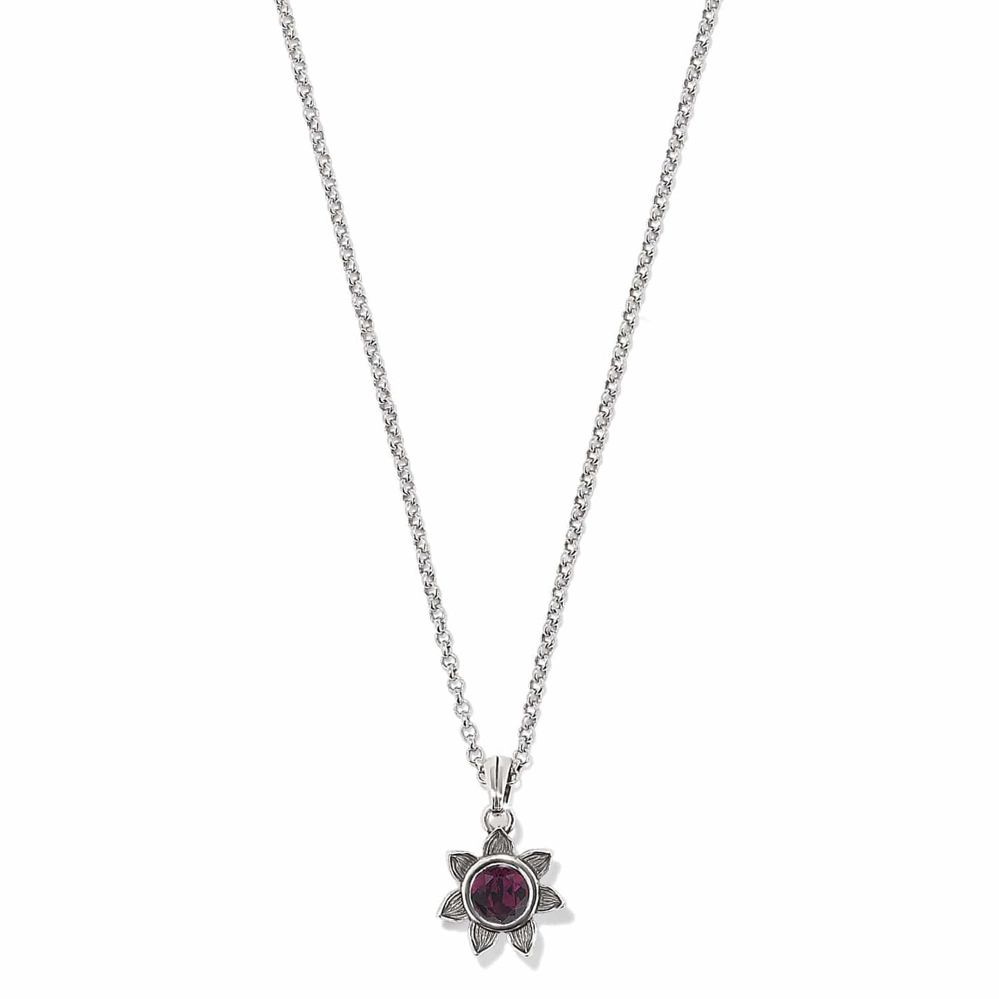 Brighton pendant necklace with silver-plated flower setting and faceted purple crystal on a white background