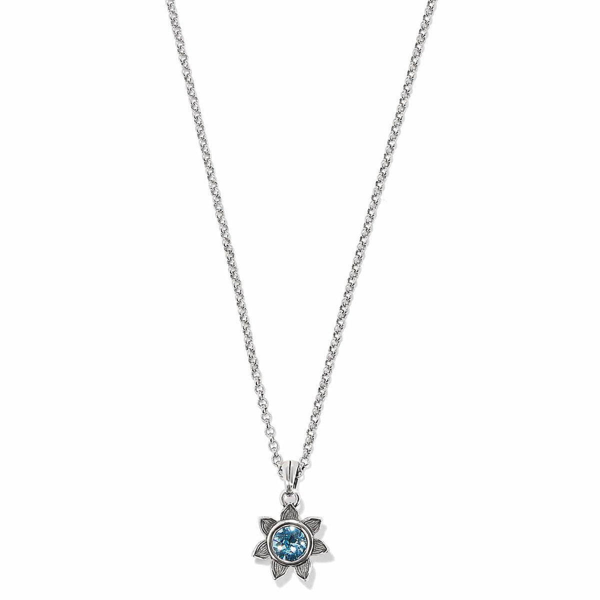 Brighton pendant necklace with silver-plated flower setting and blue crystal center on a white background