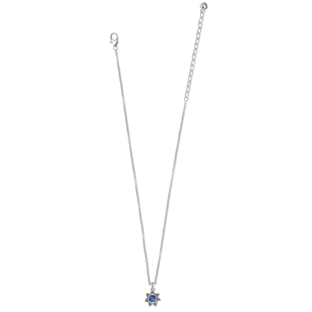 Brighton pendant necklace with blue crystal in silver-plated star setting on delicate chain on a white background