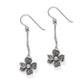Brighton drop earrings with silver-plated flower charms, crystal centers, and textured stems on a white background