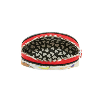 Brighton pouch shown open with red zipper trim and black heart-print interior lining on a white background