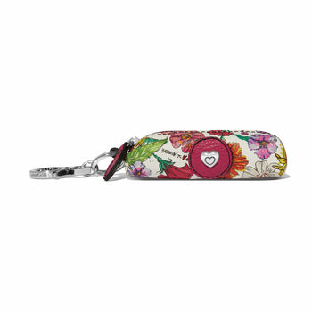 Brighton leather sunglasses case key fob with floral print, pink heart medallion, and silver-tone clip on a white background