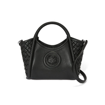 Brighton handbag in black leather with woven side panels, embossed medallion, top handles, and crossbody strap on a white background