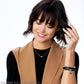 Model wearing a Brighton silver-plated pendant necklace with coordinating Brighton accessories including bracelets, ring, and stud earrings