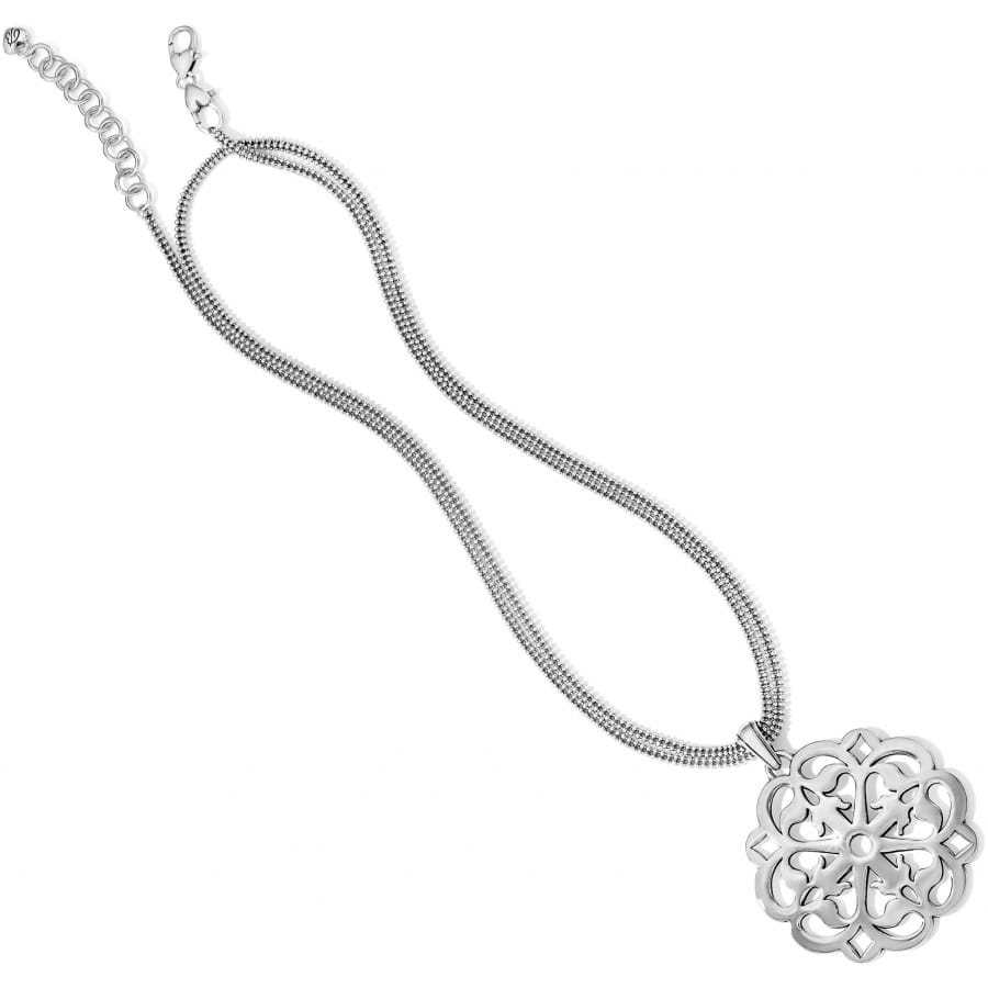 Brighton pendant necklace with silver-plated openwork medallion and beaded double chain on a white background