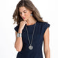 Model wearing a Brighton silver-plated pendant necklace with openwork medallion and coordinating Brighton accessories